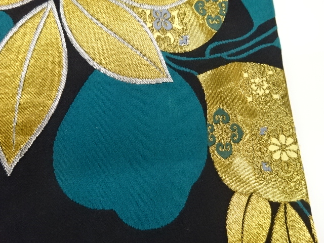  葉に華文模様織出し袋帯